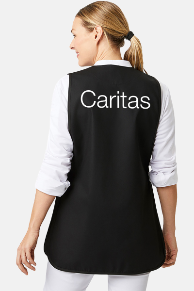 Überwurfschürze Zyra - speziell für die Caritas, Farbe: schwarz, Größe: I ( 36-42 ) mit Druck des Logos der Caritas auf der Brust
